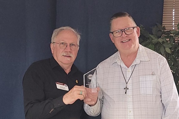 Steve Worthman receiving award at Area Toastmasters International Speech Contest, Aurora, Colorado, 2023